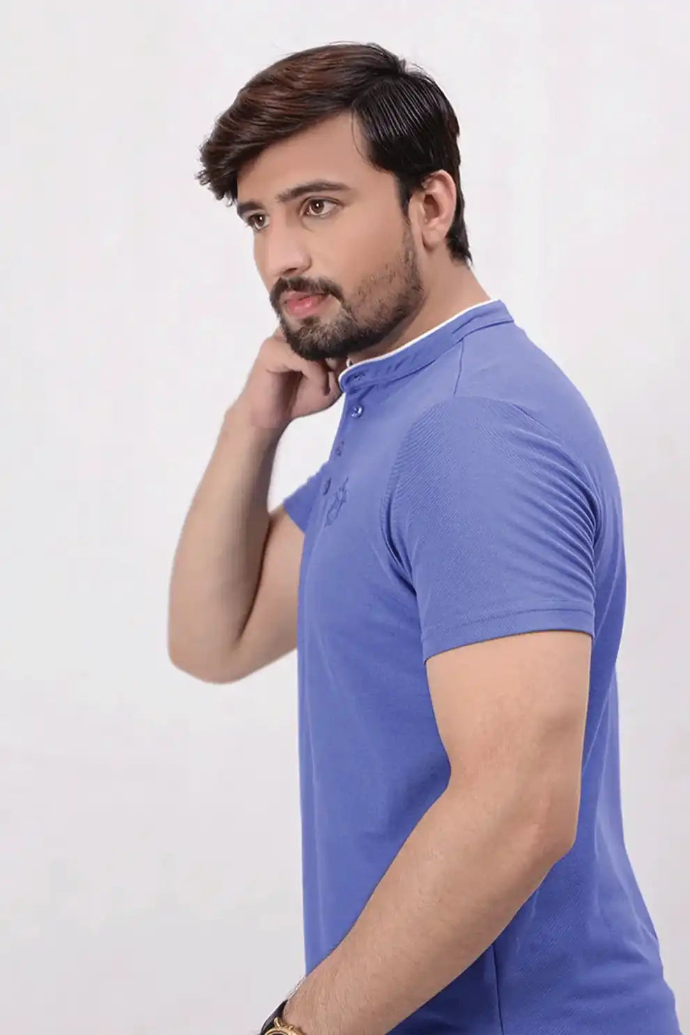 A man wearing a polo shirt