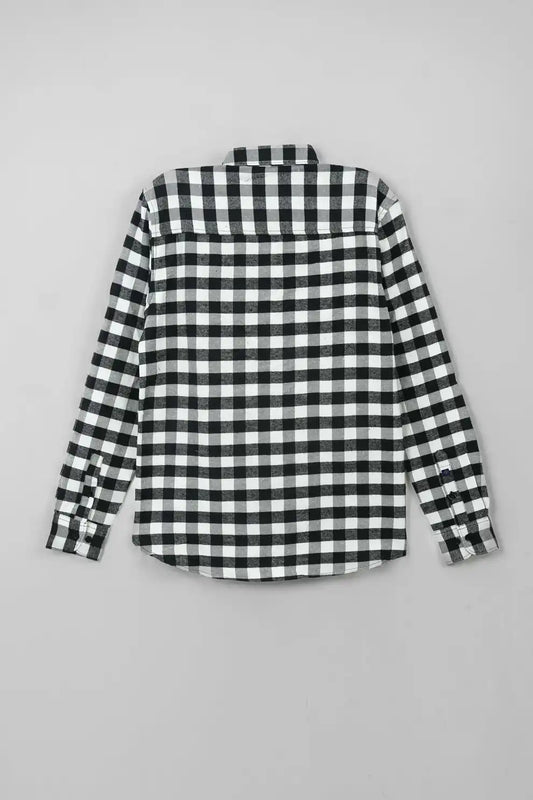Back view of black and white checkered shirt on a gray background