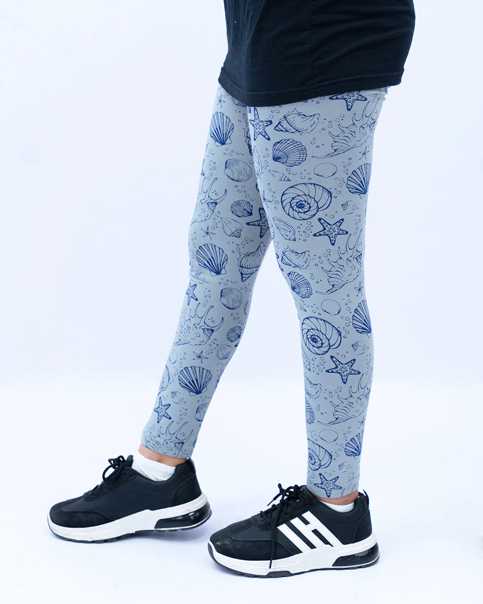 Blue leggings with a sea-themed pattern