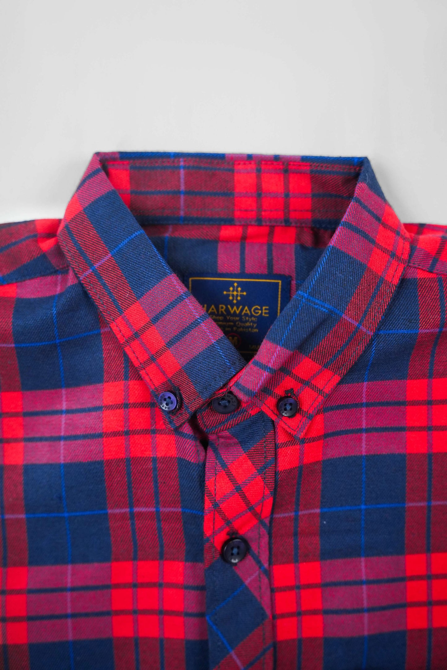 Multi-color shirt showing checked collar and button placket