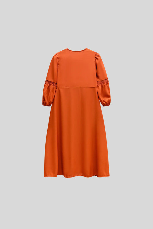 Orange dress with puff sleeves