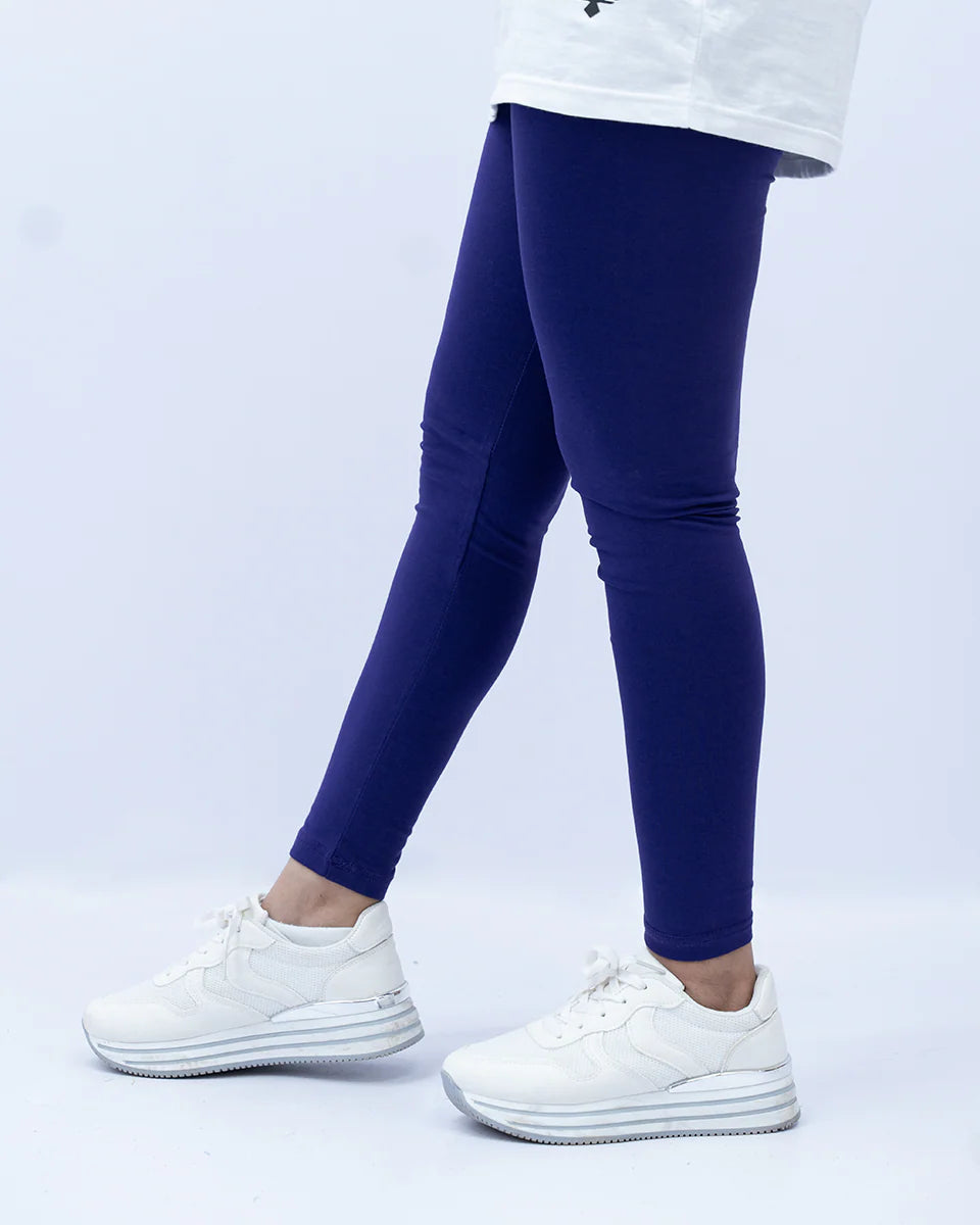 Person wearing blue leggings