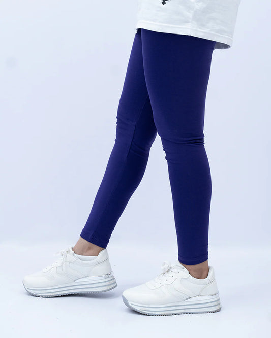 Person wearing blue leggings
