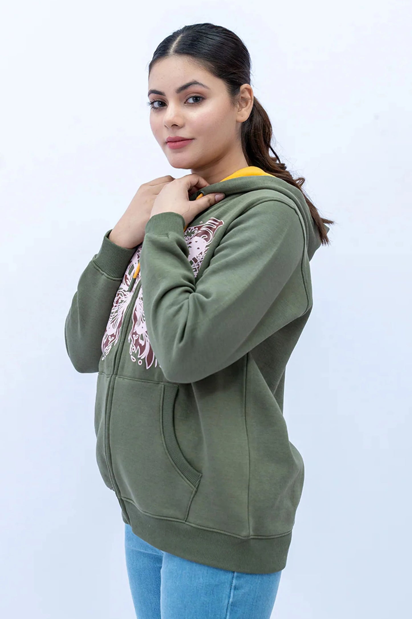Olive Green Zipper Hoodie paired with casual wear