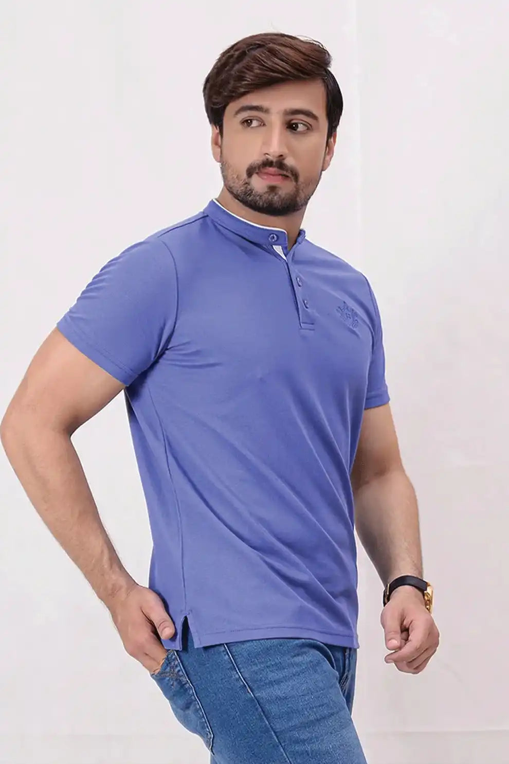 A blue polo shirt and jeans