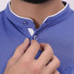 A person wearing a blue polo shirt 