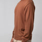 Angled view highlighting fit of Turtle Neck Sweater Brown