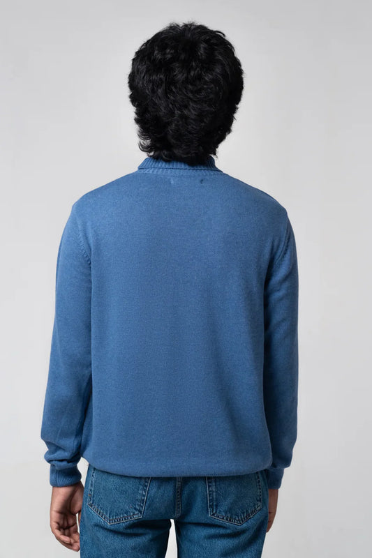 Back standing view of turtle neck sweater navy