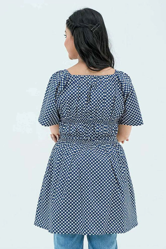 Back view of a polka dot frock shirt