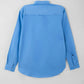 Back view of blue long-sleeve shirt