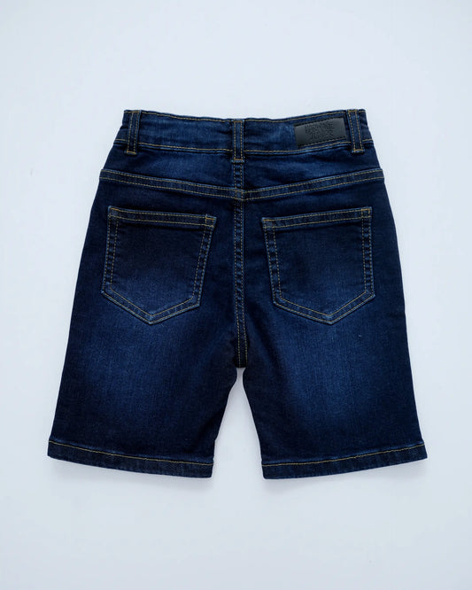 Back view of a dark blue denim shorts