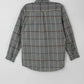Back view of gray plaid long sleeve shirt