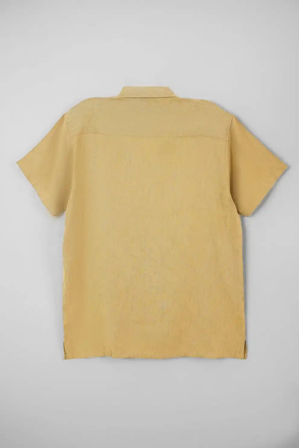 Back view of mustard short-sleeve shirt