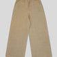 Beige pants on a light gray background