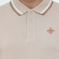 Beige polo shirt with a small logo