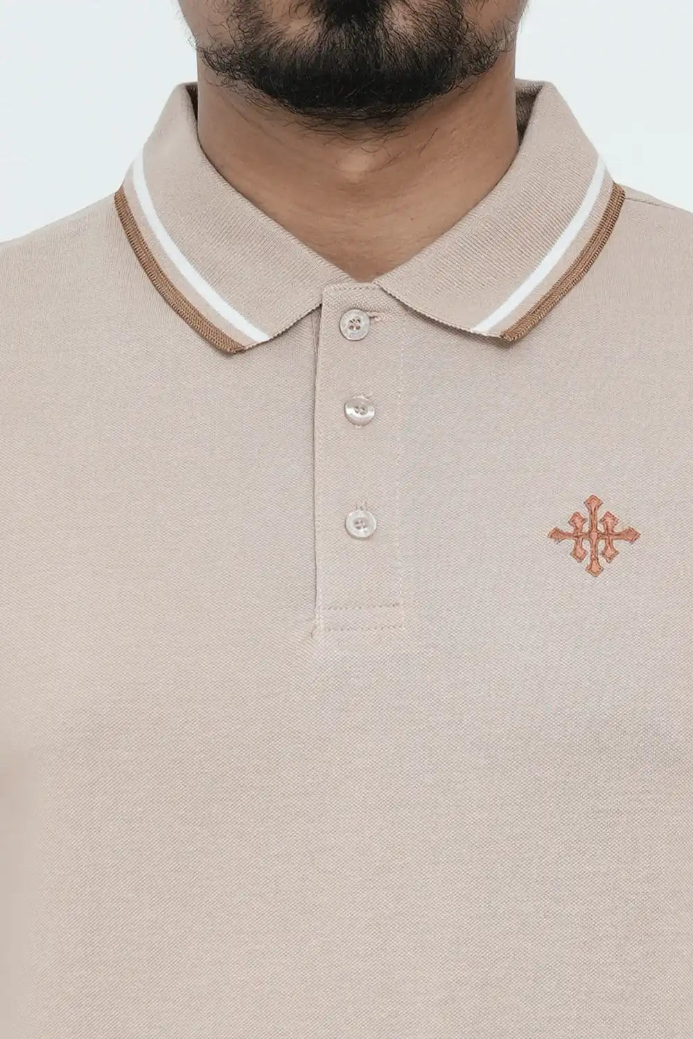 Beige polo shirt with a small logo