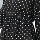Black dress with white polka dots 