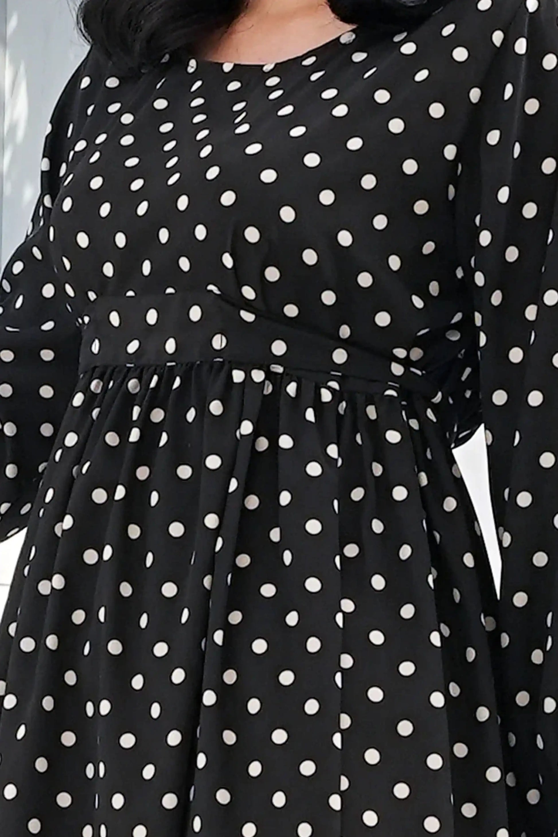 Black dress with white polka dots 