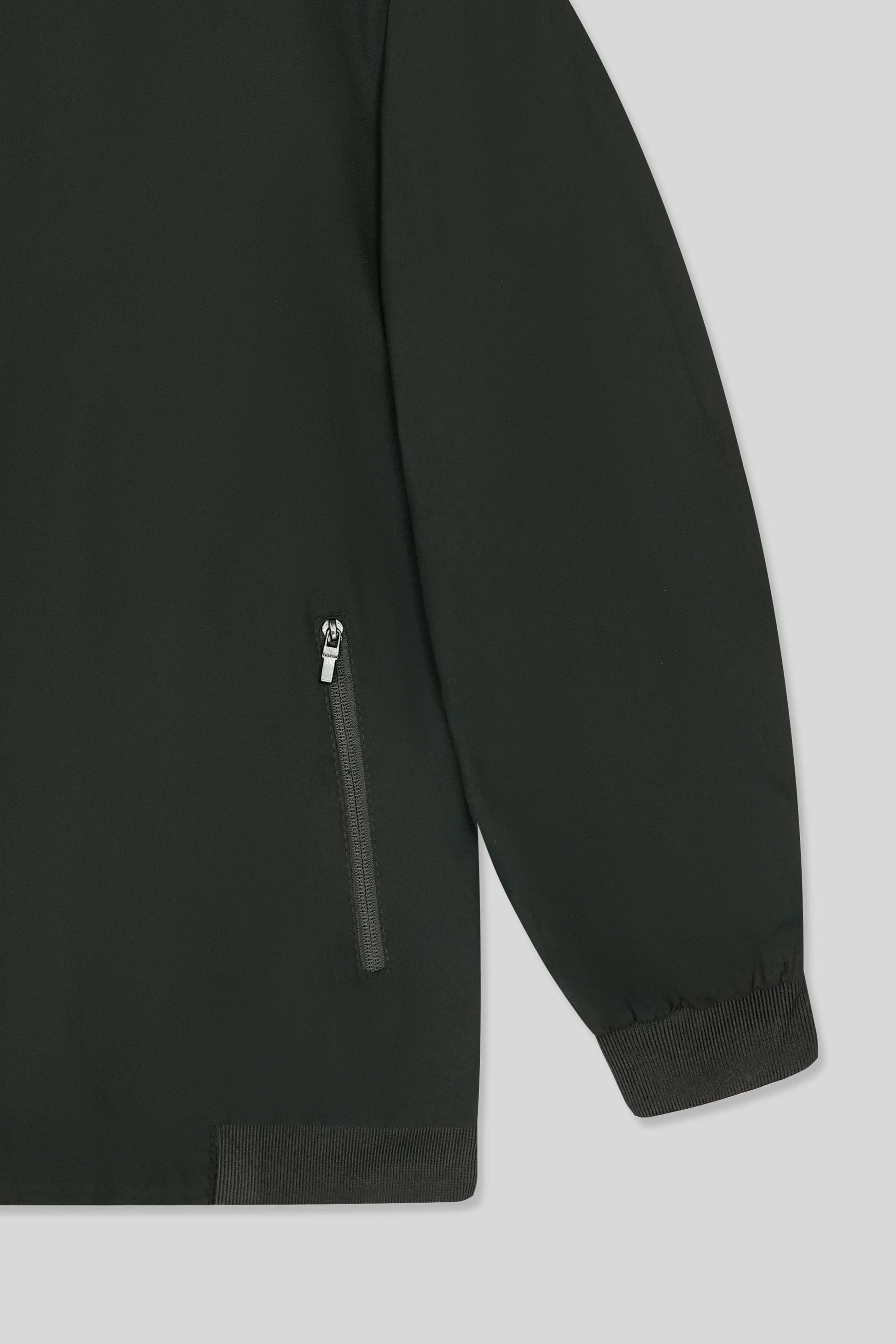 Black jacket with a zipper on a light gray background