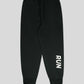 Black jogger pants with 'RUN' printed 
