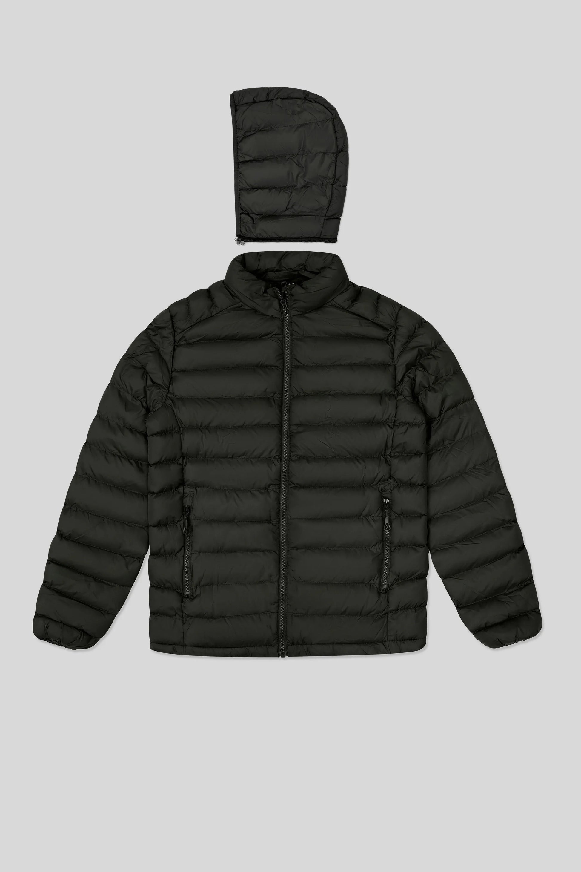 Black puffer jacket with hood on a light gray background