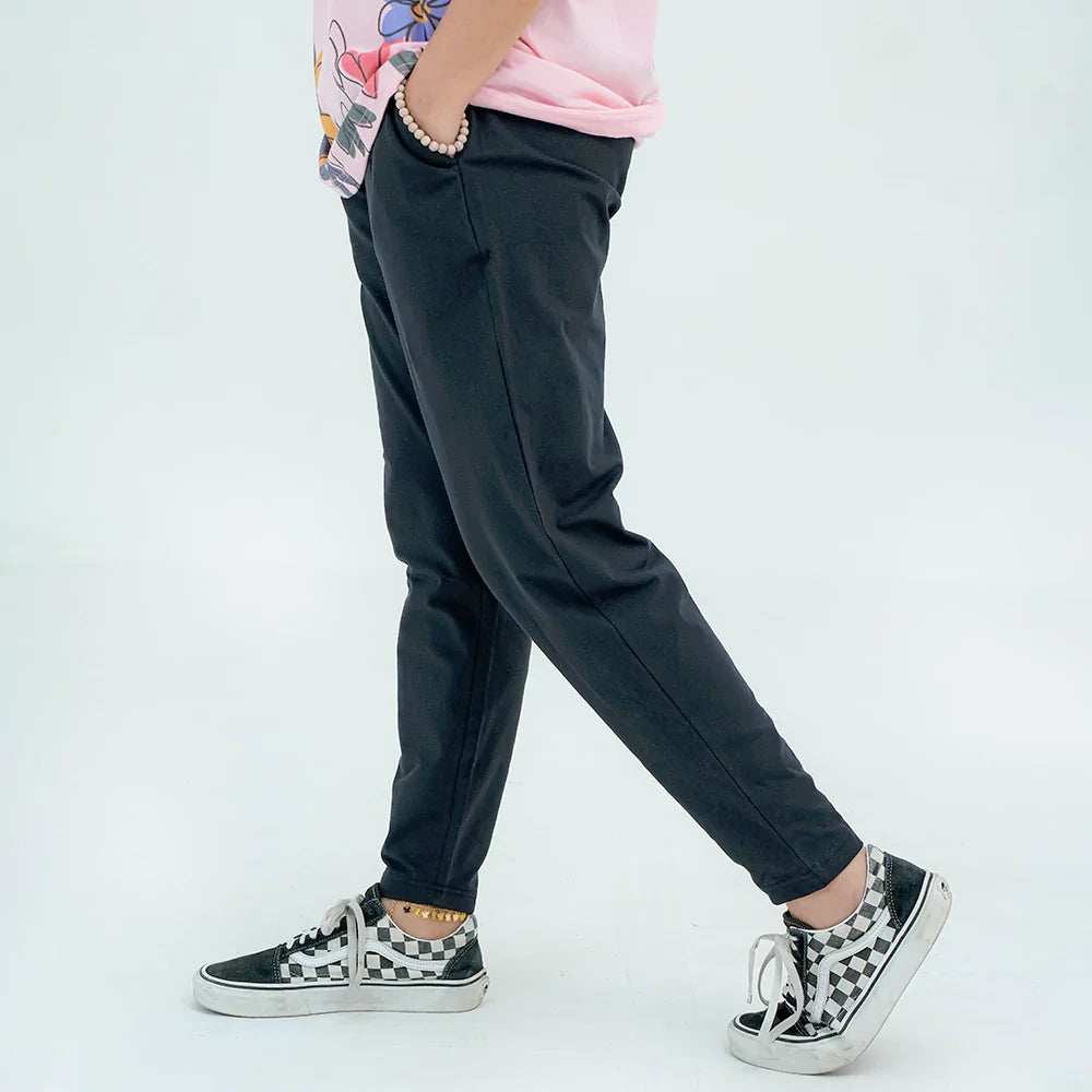Black slouchy trousers side view