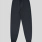 Black sweatpants on a light gray background
