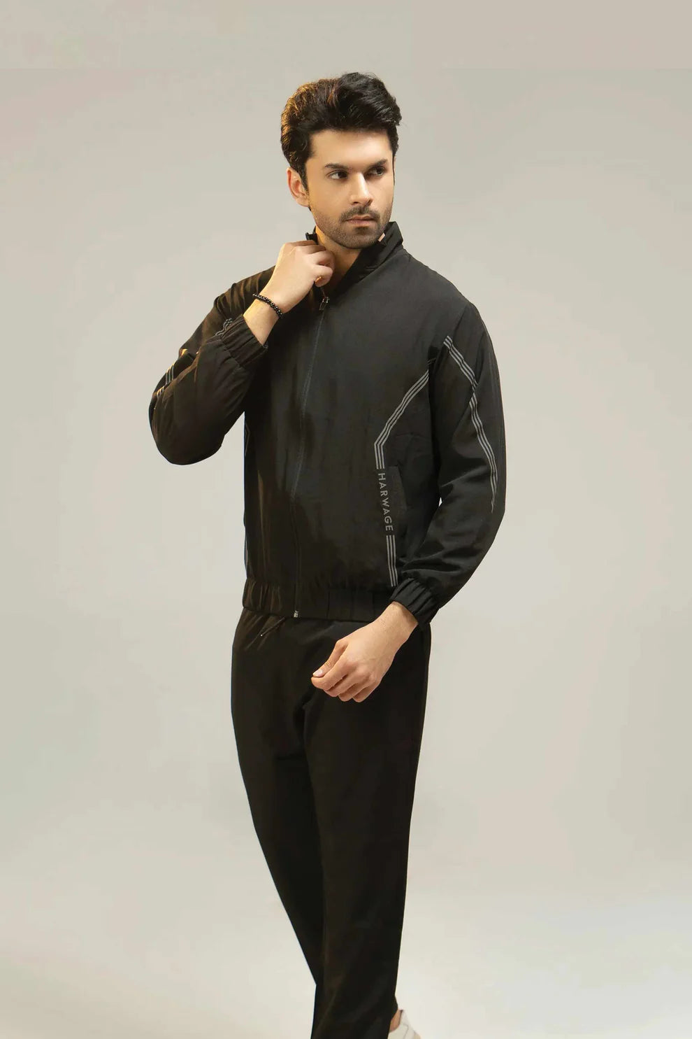 Black tracksuit side view