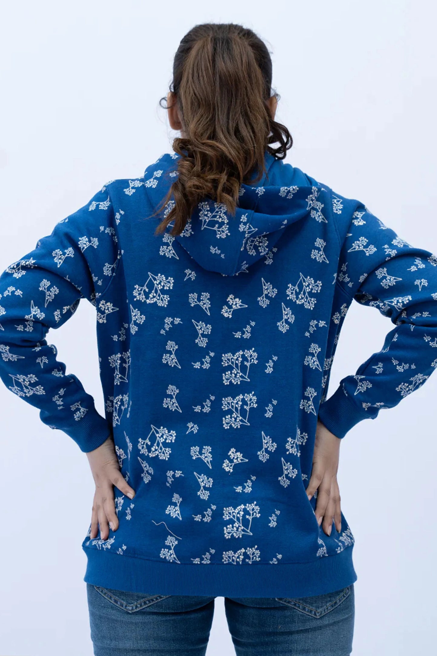 Blue Zipper Hoodie featuring an all-over white floral pattern