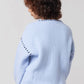 Blue cardigan back view