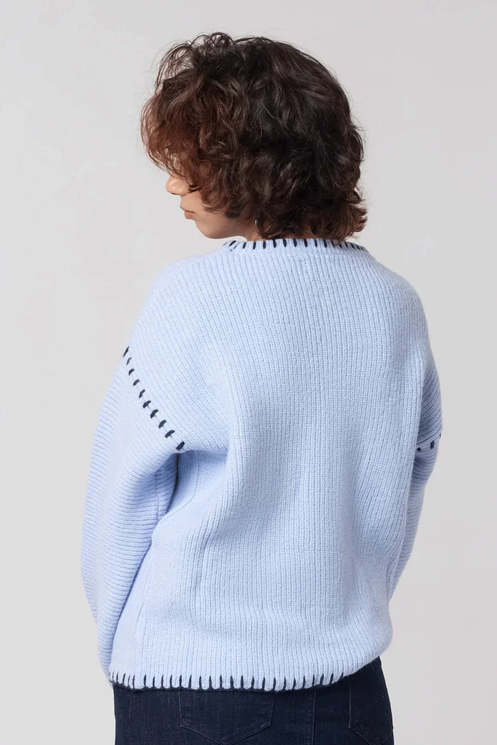 Blue cardigan back view