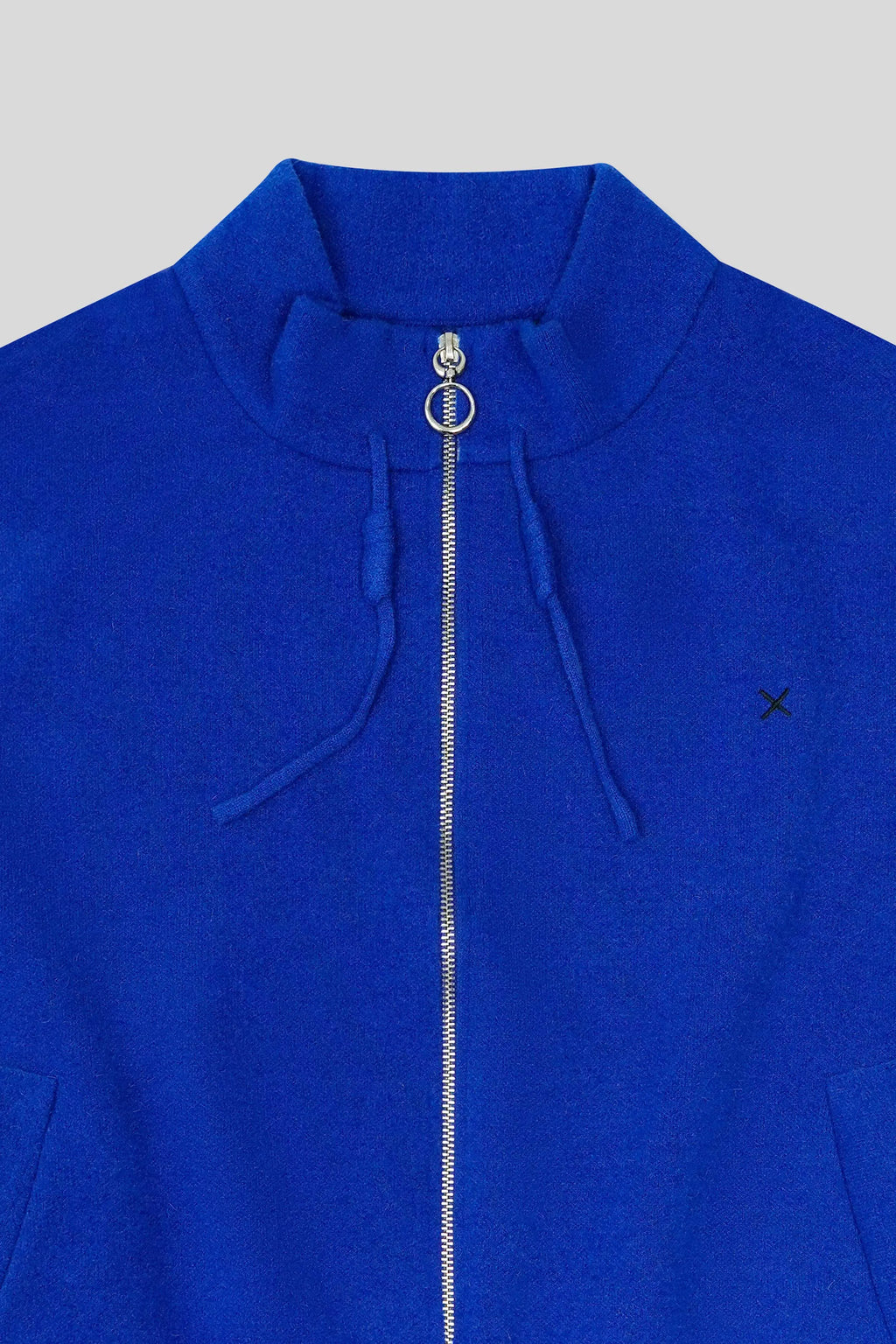 Blue wool cardigan featuring a smooth zipper and refined knit