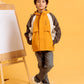 Front view of junior boy modeling Breaker Jacket in Harvest Gold