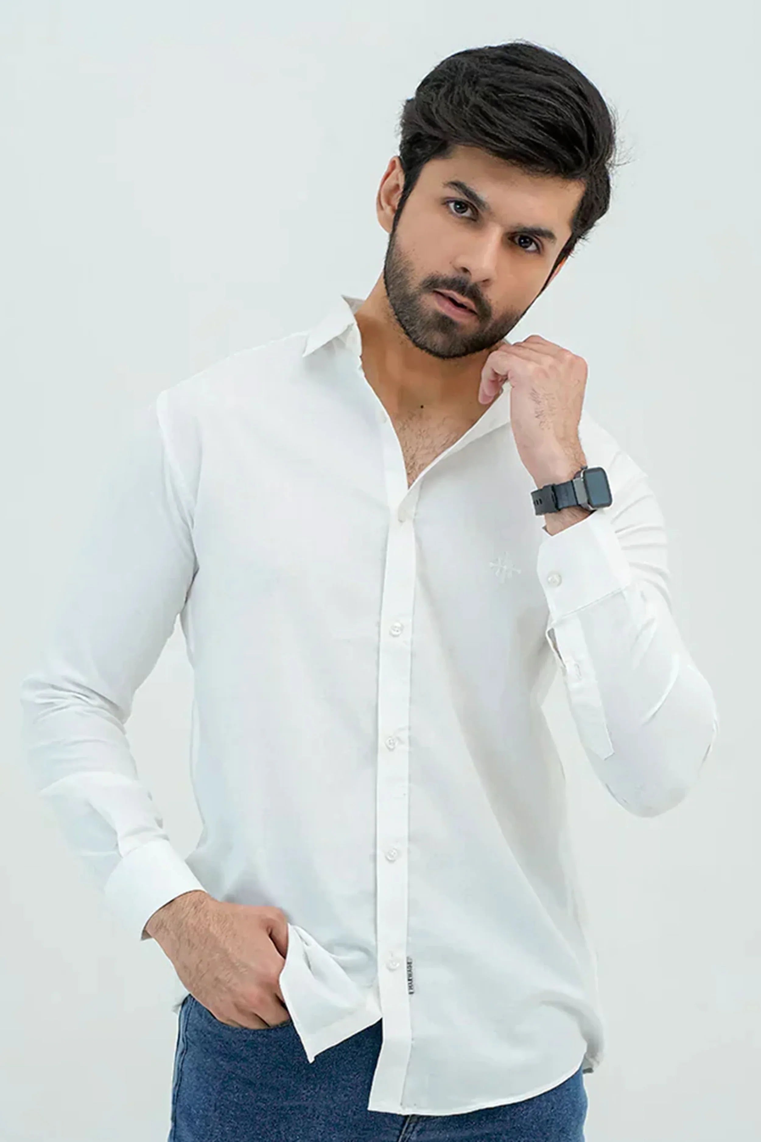 White Oxford Shirt worn by male model with hand in pocket