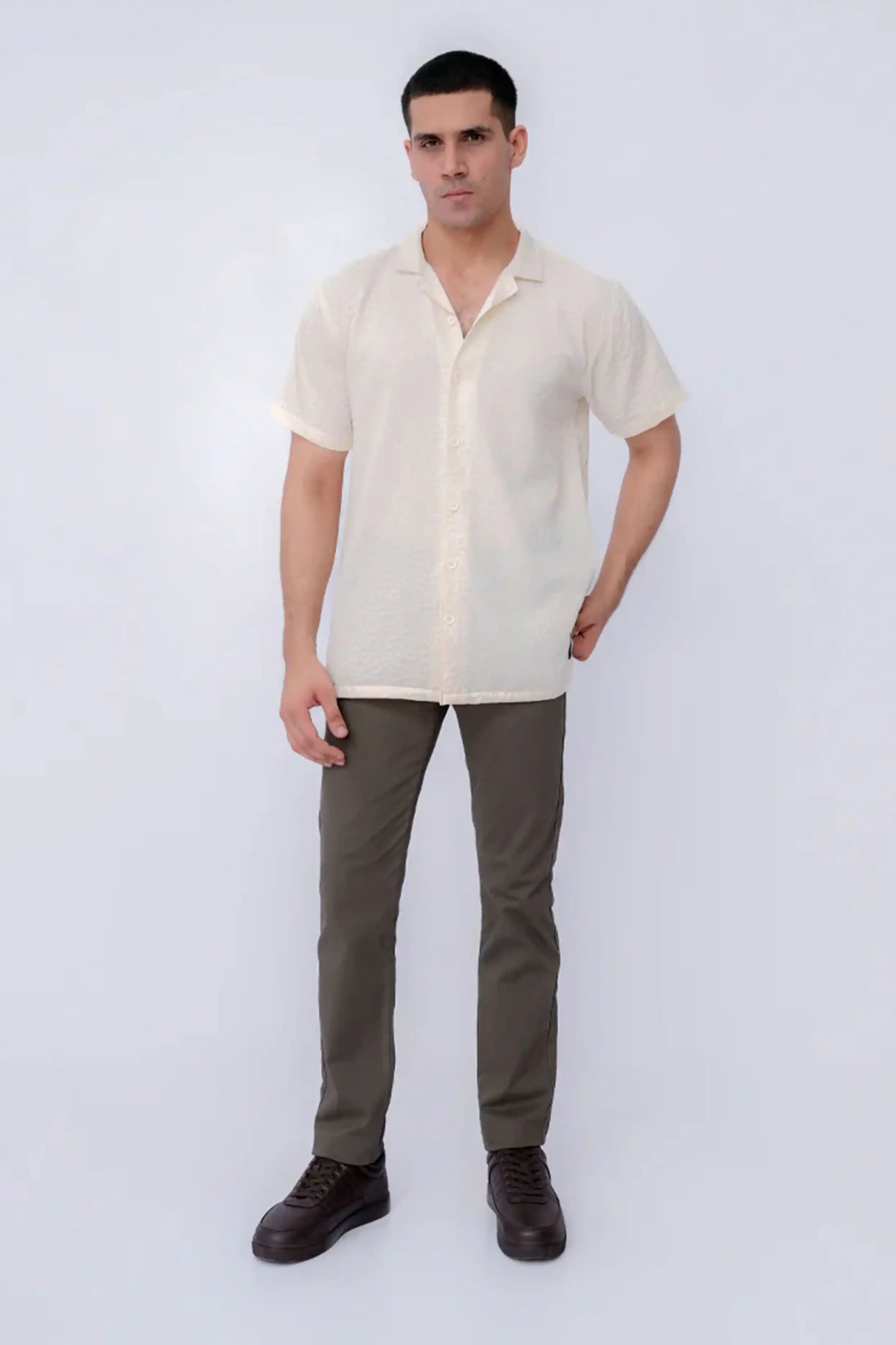 Casual short-sleeve shirt with gray pants 