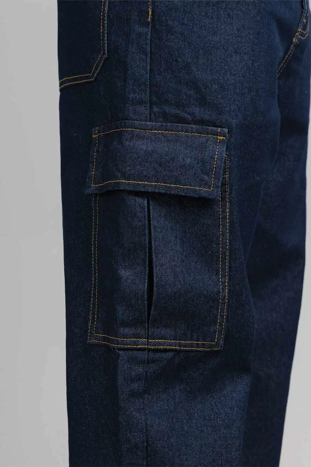 Close-up of dark blue denim pants with a pocket