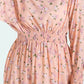 Close-up of peach maxi dress