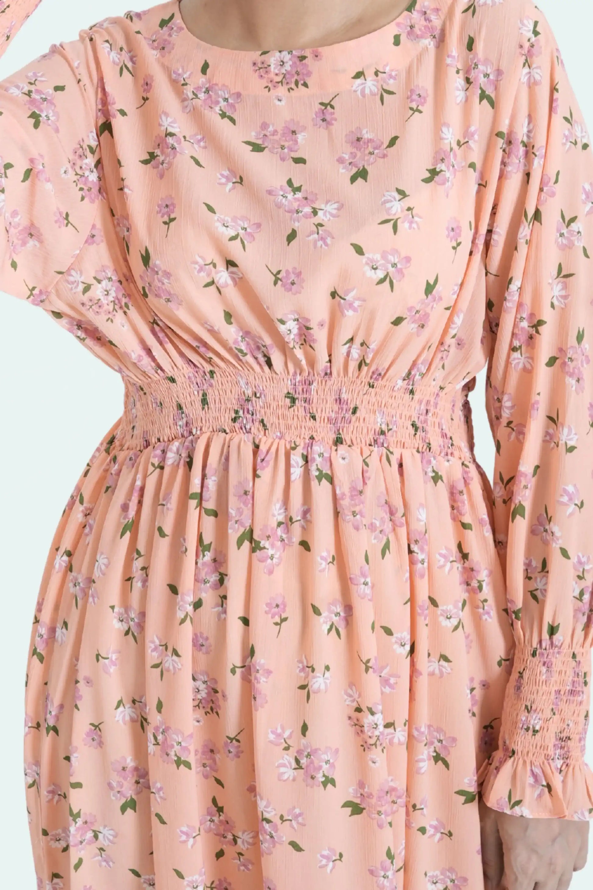 Close-up of peach maxi dress