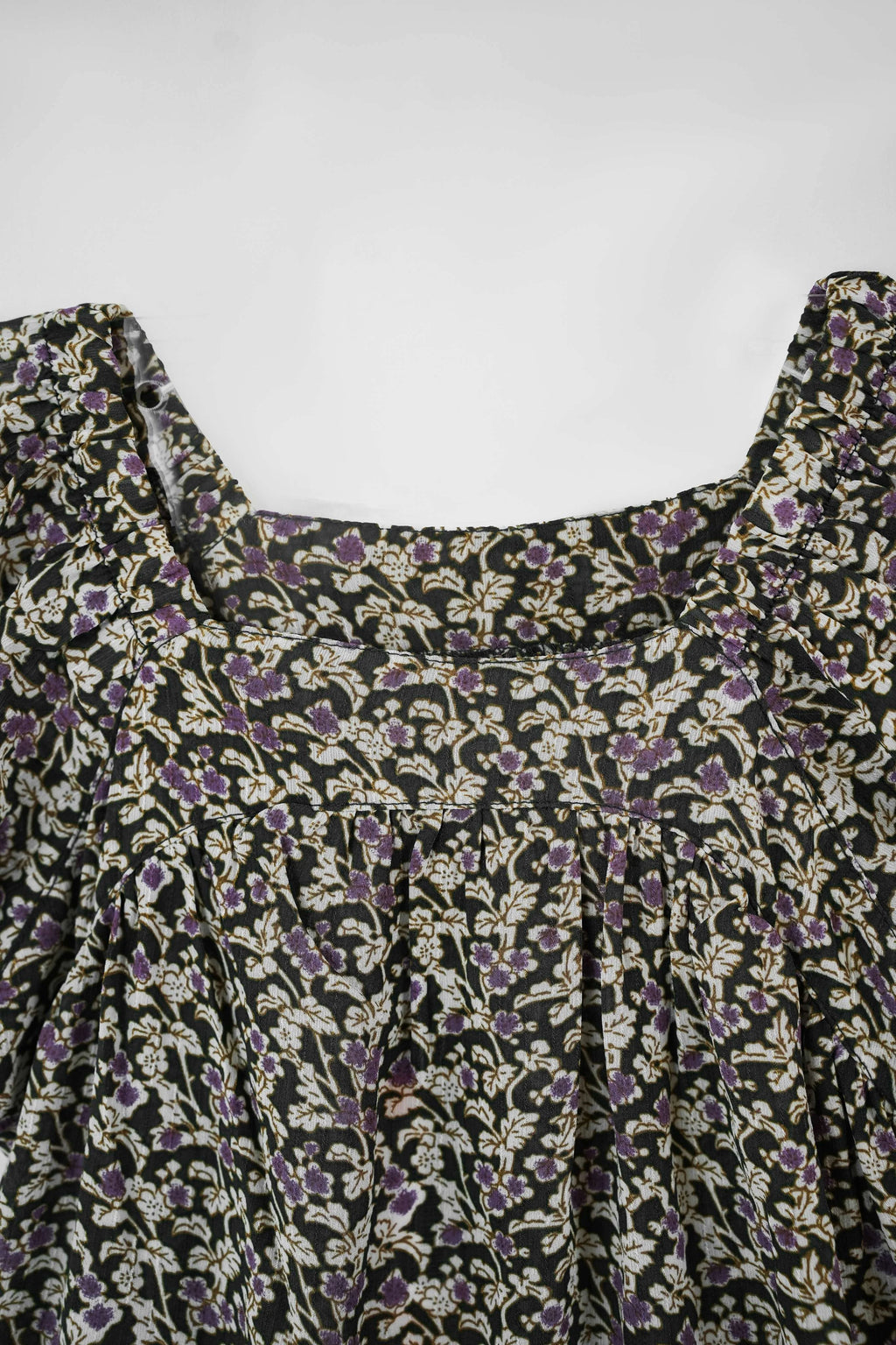 Close view of floral top