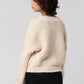 Cream knit cardigan back view
