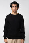 Crew neck cable knit sweater black front view worn by model