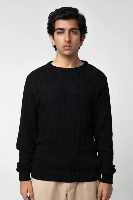 Crew neck cable knit sweater black front view worn by model