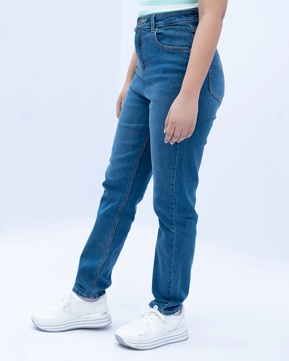 Dark wash jeans side view