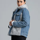 Woman wearing a denim jacket with fur trim