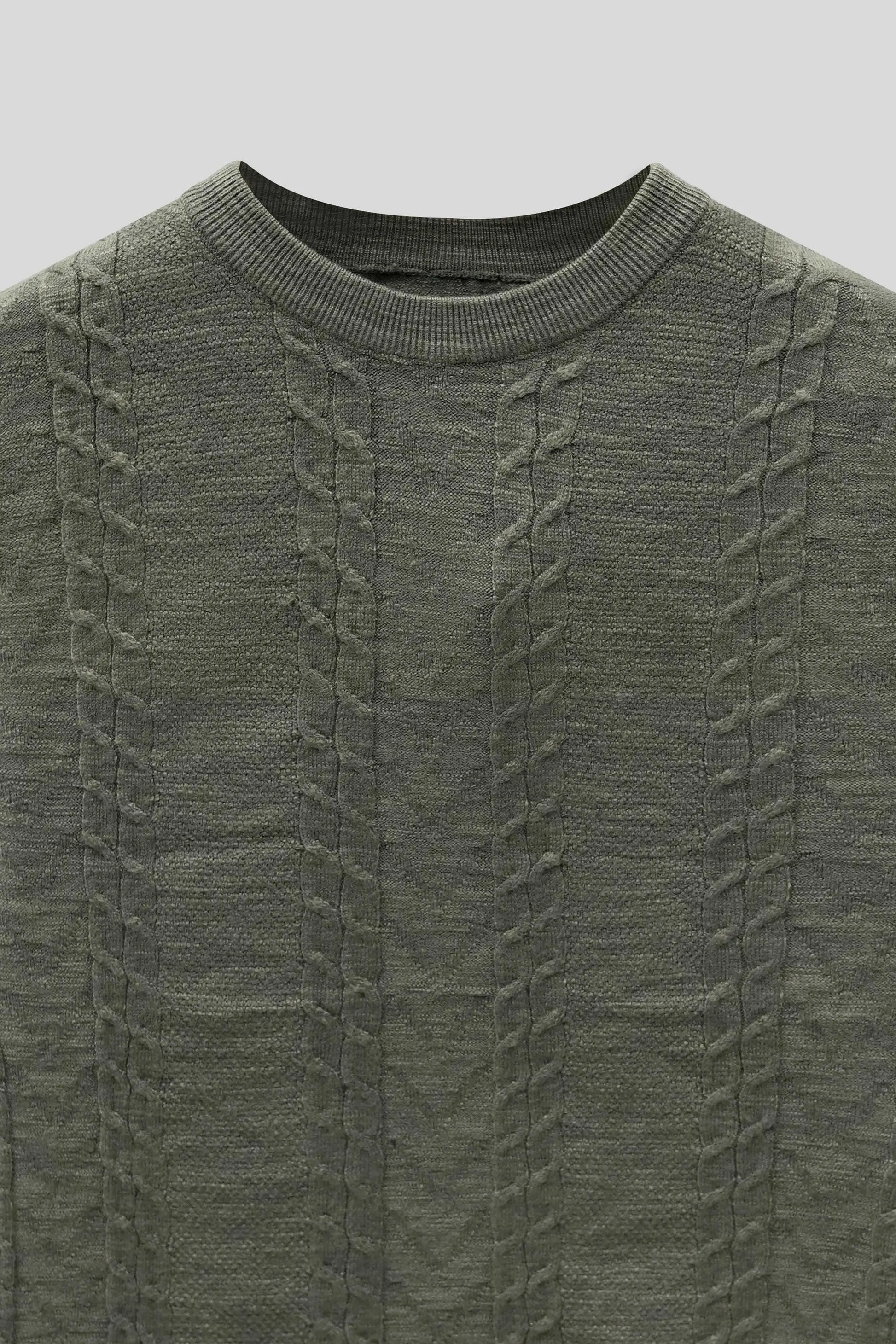 Fabric close up highlighting the knit texture of the wool cardigan olive