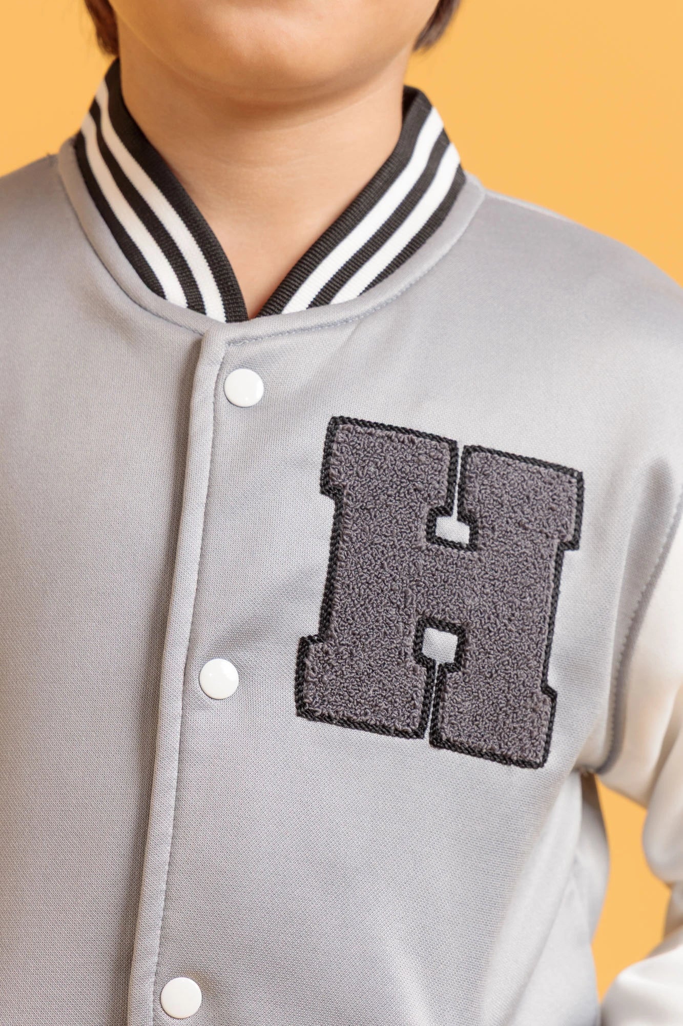Front close up of Baseball Jacket in Wild Dove