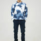 Front standing pose highlighting blue tie-dye camouflage pattern