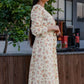 Girl in an off-white maxi dress