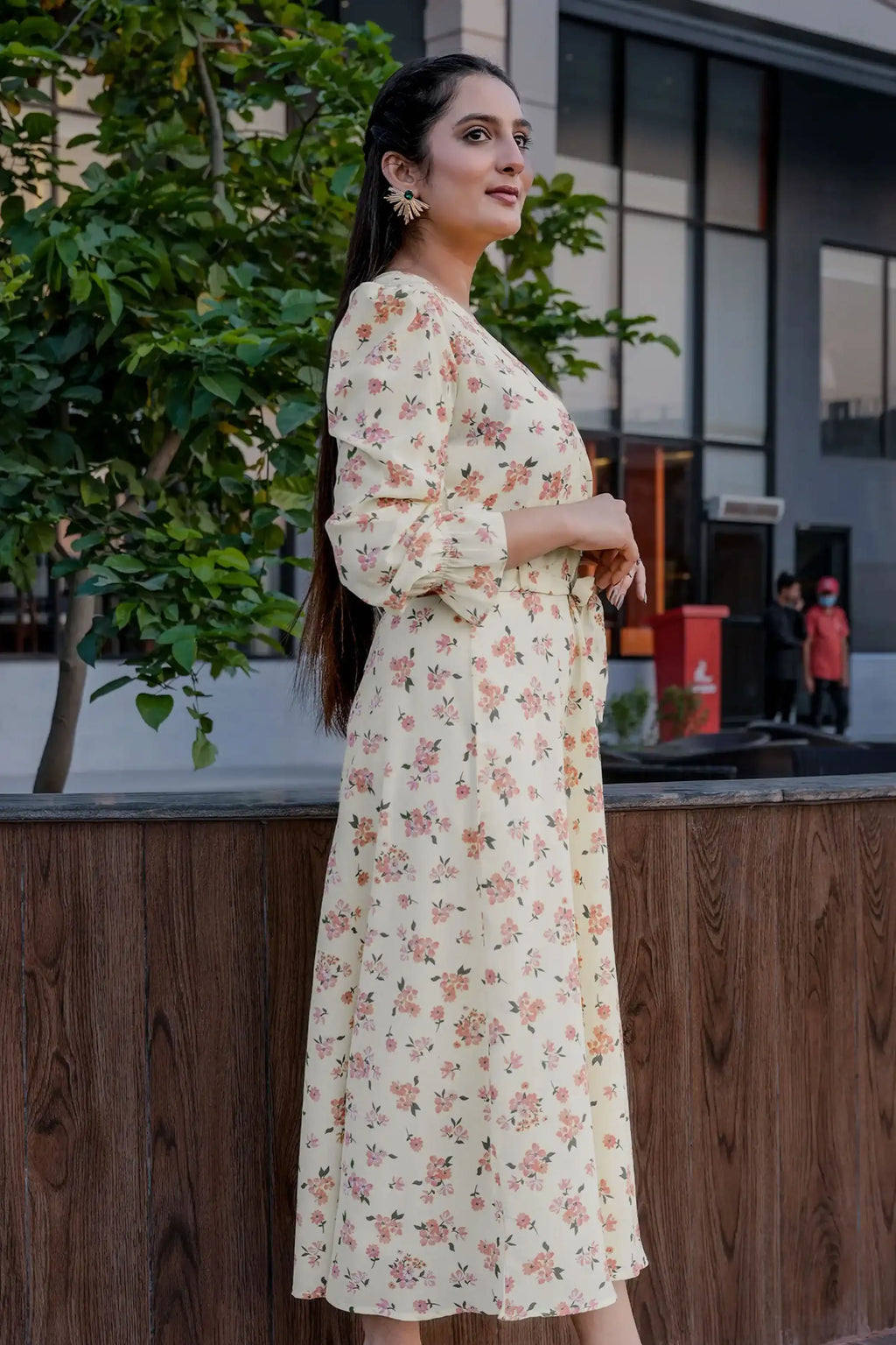 Girl in an off-white maxi dress