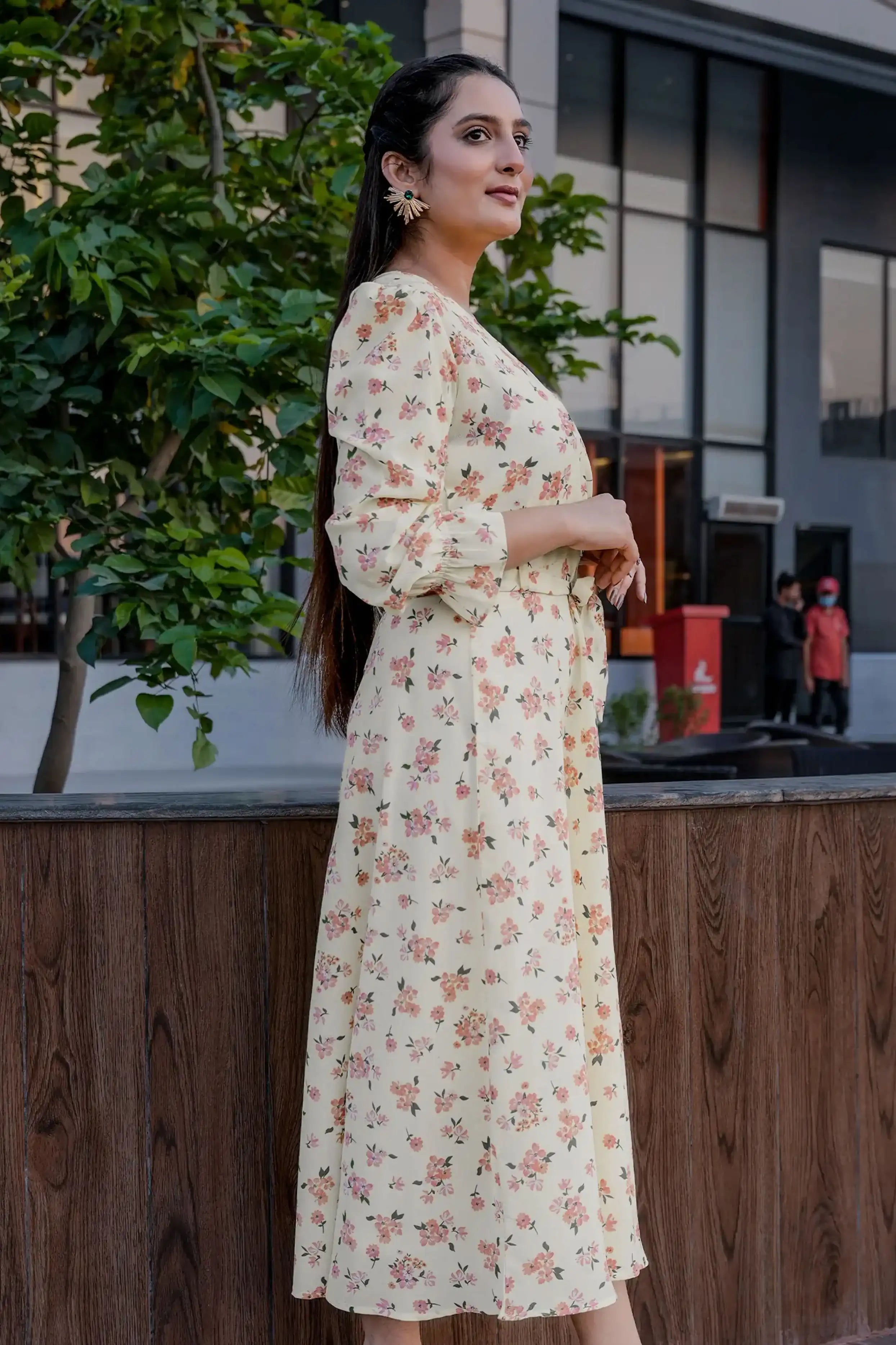 Girl in an off-white maxi dress